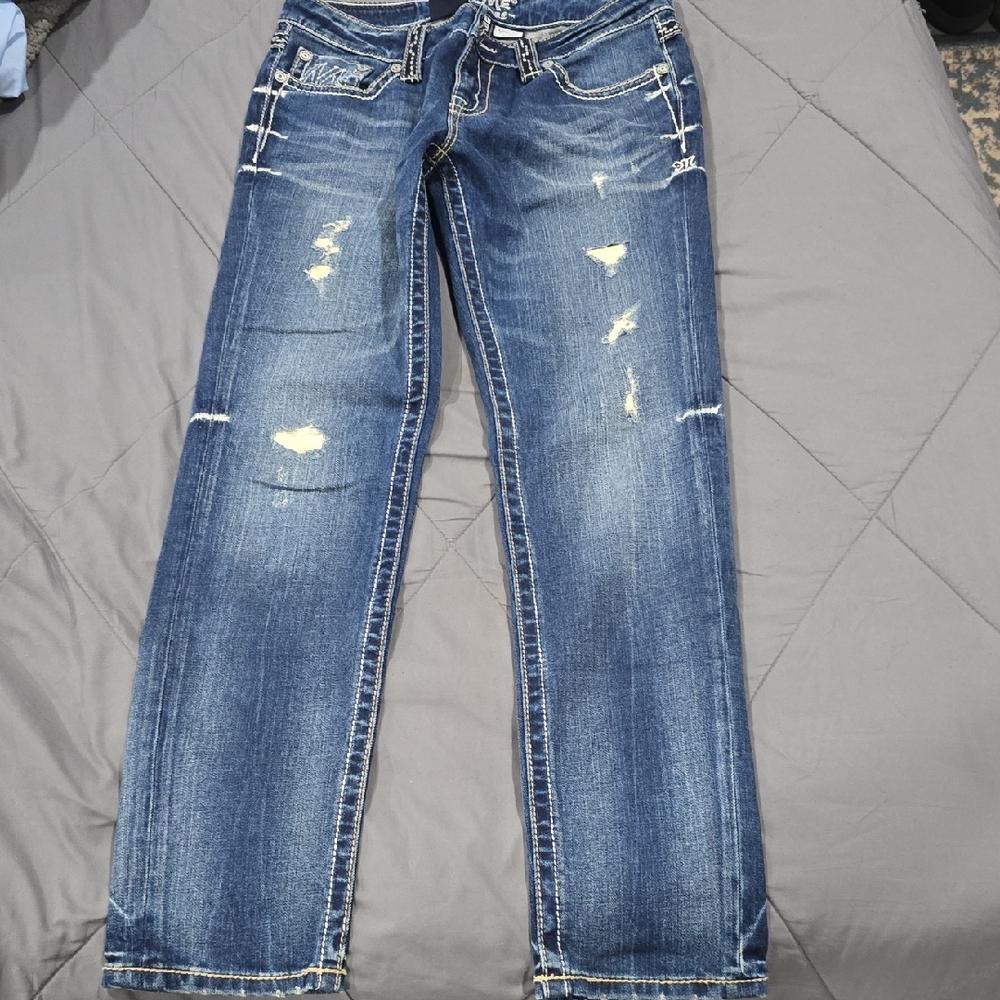 Distressed Blue Jeans